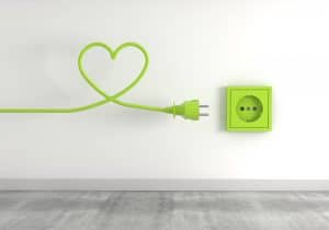 3d Render Of A Green Electrical Plug Isolated On A Socket Background Eco Energy Concept